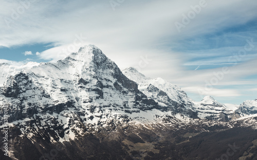view to the Eiger-Nordwand in front of cloudy sky. Grindelwald, Switzerland