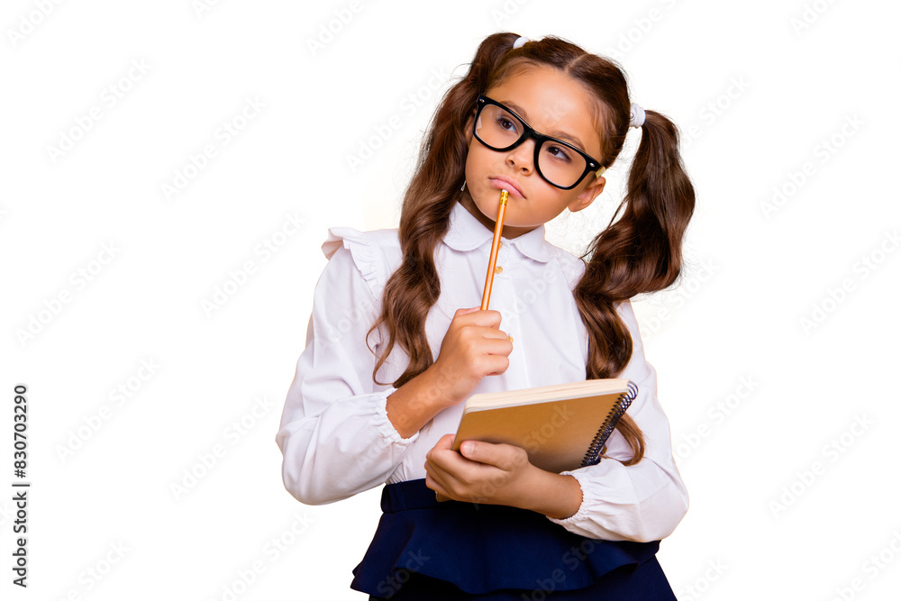 Close up portrait of pensive, tired, small brunette girl looking away stand isolated on bright yellow background Close up portrait of pensive, tired, small brunette girl looking away stand isolated on bright yellow background