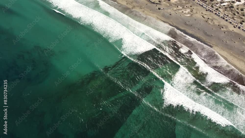 Panup View Aerial pan up view of Caleta de Famara is village at mountain range ...