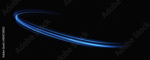 Abstract light lines of speed movement, blue colors.Neon glowing curves.Abstract motion.Neon lines of blue speed. Dynamic traces.