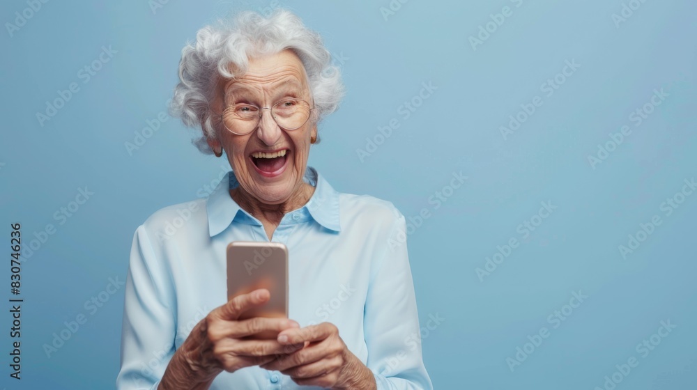 The elderly woman with smartphone The elderly woman with smartphone