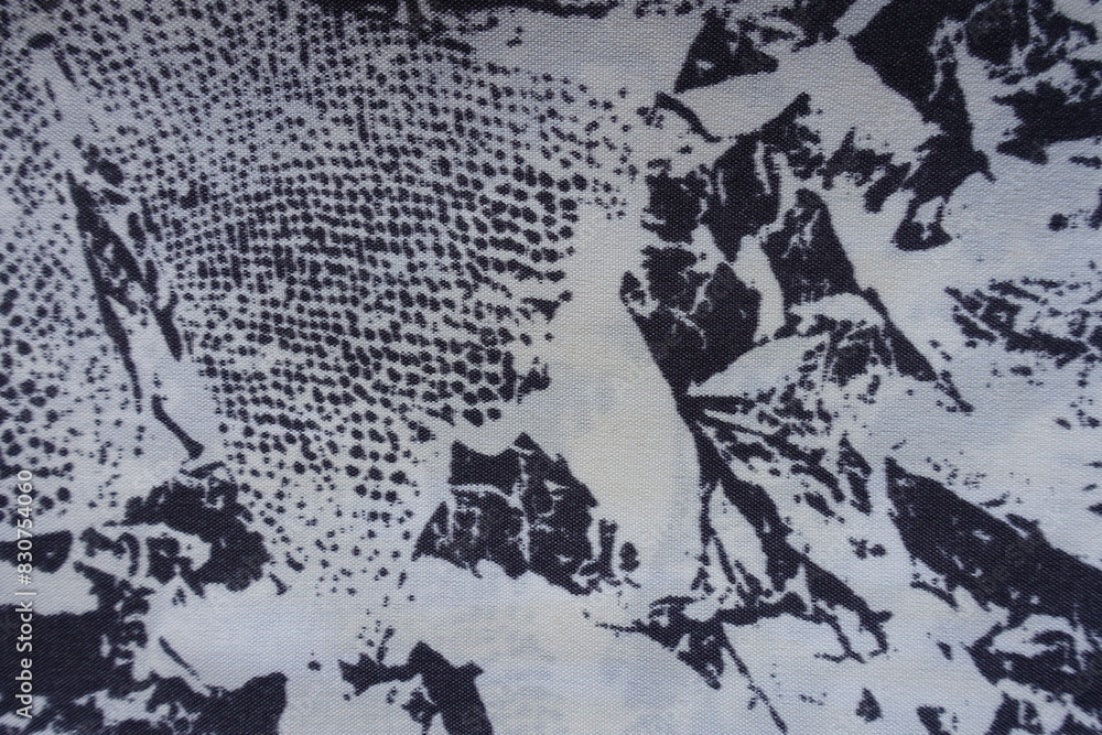 Fototapeta premium Close shot of white and dark blue fabric with abstract print