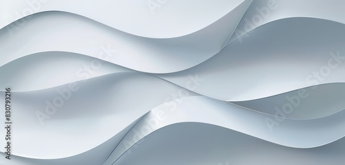 Smooth, curved silver waves form a minimalist and elegant texture, perfect for a contemporary backdrop.