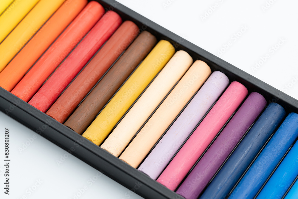 Set of colorful oil pastels on white background.Oil pastels color in box isolated on white background. Crayons Set of colorful oil pastels on white background.Oil pastels color in box isolated on white background. Crayons