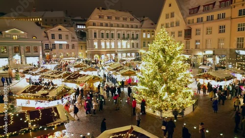 Christmas decoration in the main square in Tallin, the christmas tree and the stores full of people, chrstmas market
