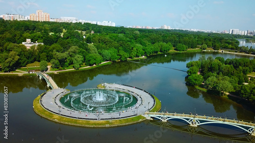 Photography Top view of bridges in city pond with fountains