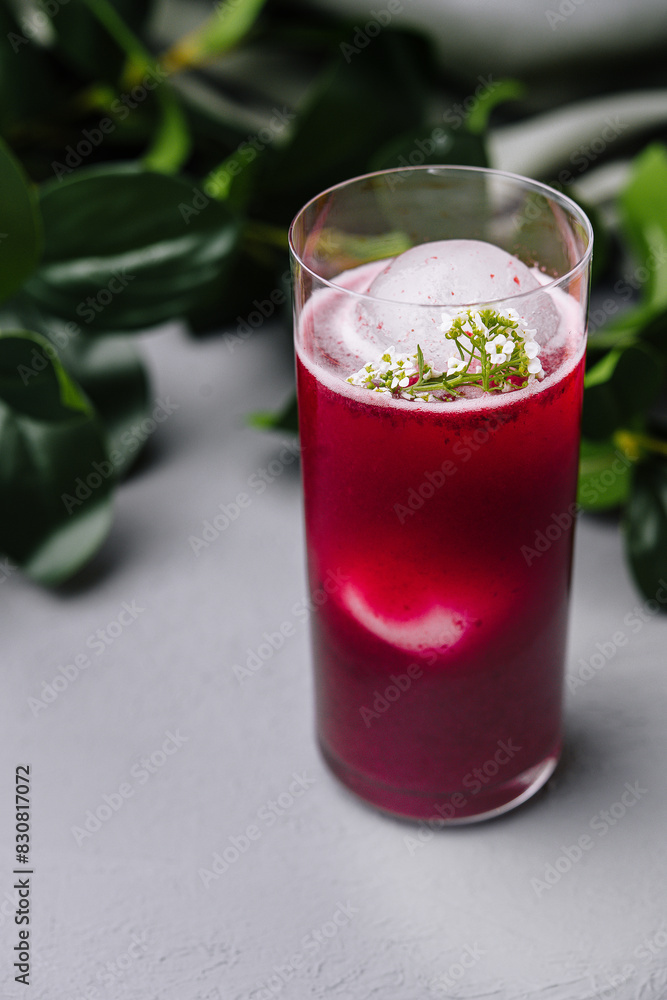 Refreshing beetroot smoothie with herbal garnish