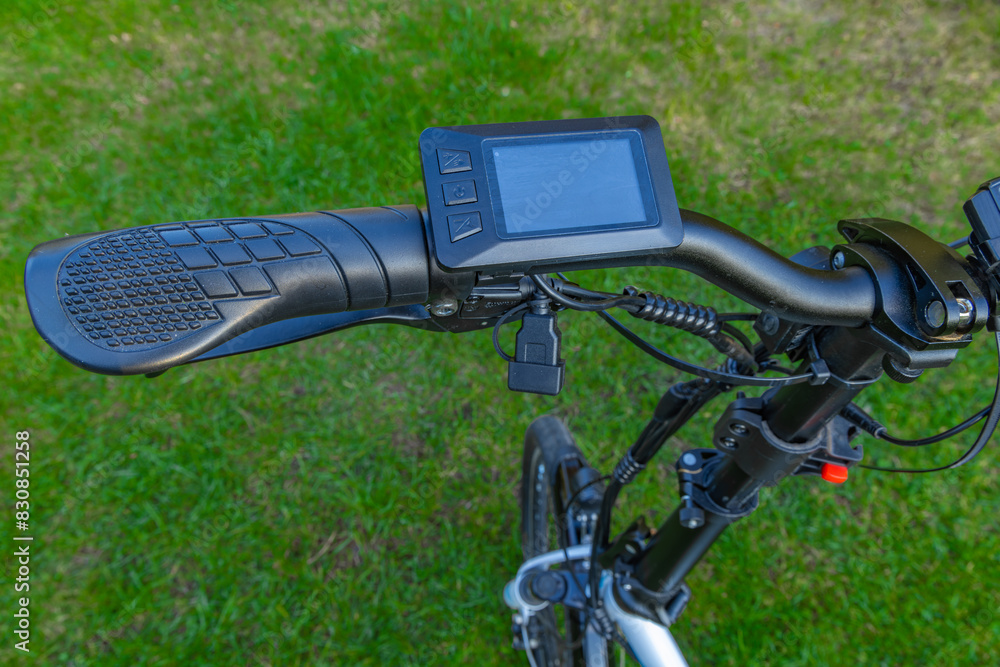 Speed counter, odometer on the handlebar of an electric bike Speed counter, odometer on the handlebar of an electric bike