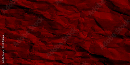 Wrinkled red paper texture background. Red background and wallpaper by crumpled paper texture and free space. stock photo