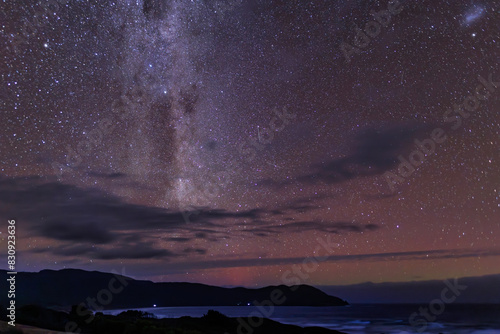 Aurora and night sky at Cloudy Bay, Bruny Island, Tasmania, Australia