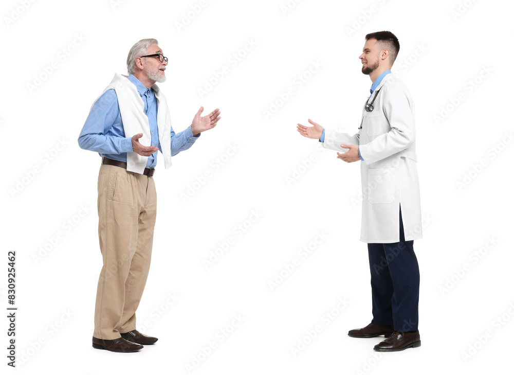 Doctor and senior man talking on white background. Dialogue Doctor and senior man talking on white background. Dialogue