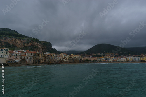 Fototapeta Naklejka Na Ścianę i Meble -  Townscape of the port of Cefalu on a cloudy rainy day, Cefalu, Sicily, Italy