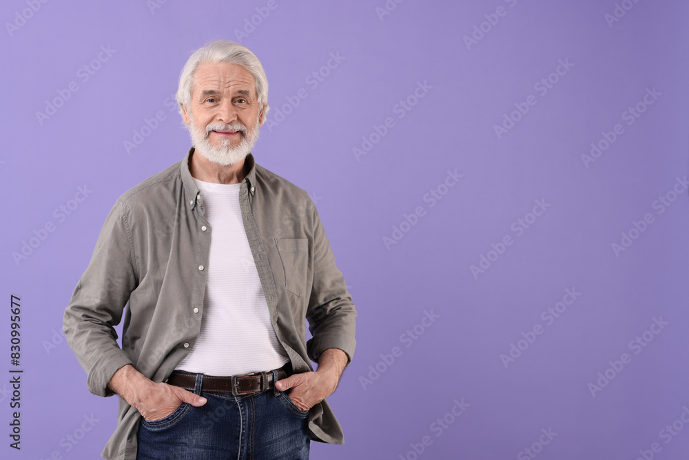 Portrait of stylish grandpa on purple background, space for text Portrait of stylish grandpa on purple background, space for text