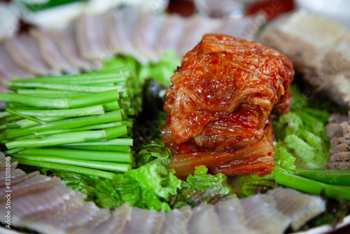 View of kimchi with water parsley in samhap photo