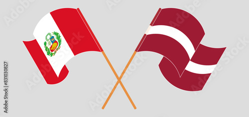 Crossed and waving flags of Peru and Latvia photo