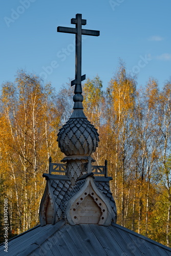 Moscow oblast. Russia. September 27, 2023. Fragments of Orthodox churches made of wooden beams in the historical complex Gremyachy Klyuch. photo