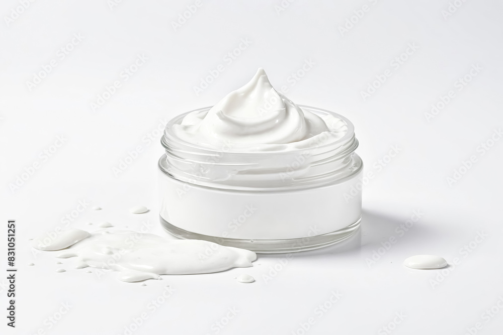 White Cream in Glass Jar with Spilled Cream White Cream in Glass Jar with Spilled Cream