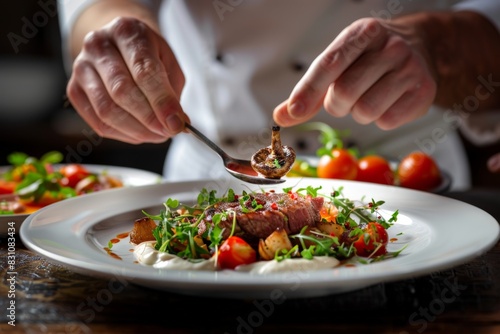 An expert chef elegantly adds the final touches to a beautifully plated gourmet dish in a high-end restaurant setting