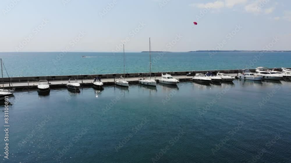 Panoramic aerial view of ships and yachts at the sea port marina of Sveti Vlas in Bulgaria near Sunny Beach and Nessebar. Aerial photography, drone view from above. Summer holidays in Europe during on Panoramic aerial view of ships and yachts at the sea port marina of Sveti Vlas in Bulgaria near Sunny Beach and Nessebar. Aerial photography, drone view from above. Summer holidays in Europe during on