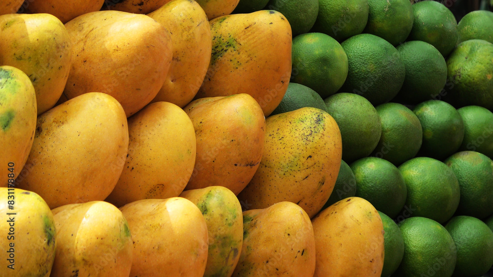 Delicious fruits displayed in a fruit stall Delicious fruits displayed in a fruit stall