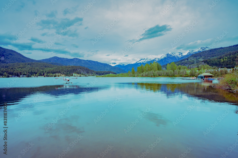 Obraz premium Scenic lake view from Valley Trail, Whistler, BC, Canada, with alpine mountain backdrop