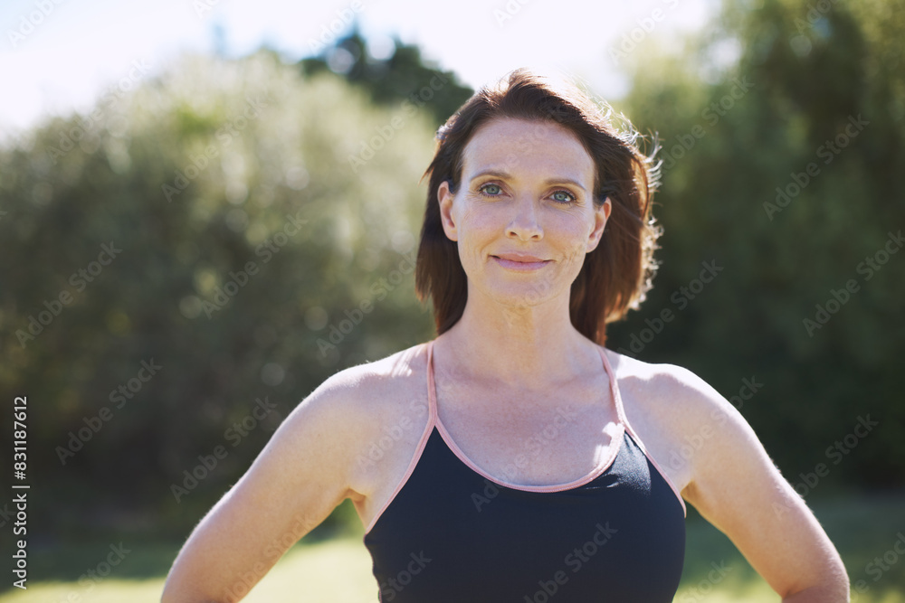 Mature, woman and fitness portrait outside in nature, happy and gym workout with confident athlete. Health, sports and body training with female person on break, backyard and wellness or energy Mature, woman and fitness portrait outside in nature, happy and gym workout with confident athlete. Health, sports and body training with female person on break, backyard and wellness or energy
