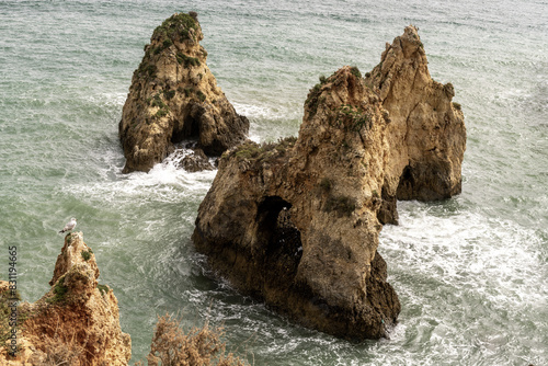 Cliffs on the coast of Portimao - Portugal photo
