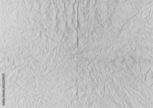 Halftone crumpled paper texture with a transparent background