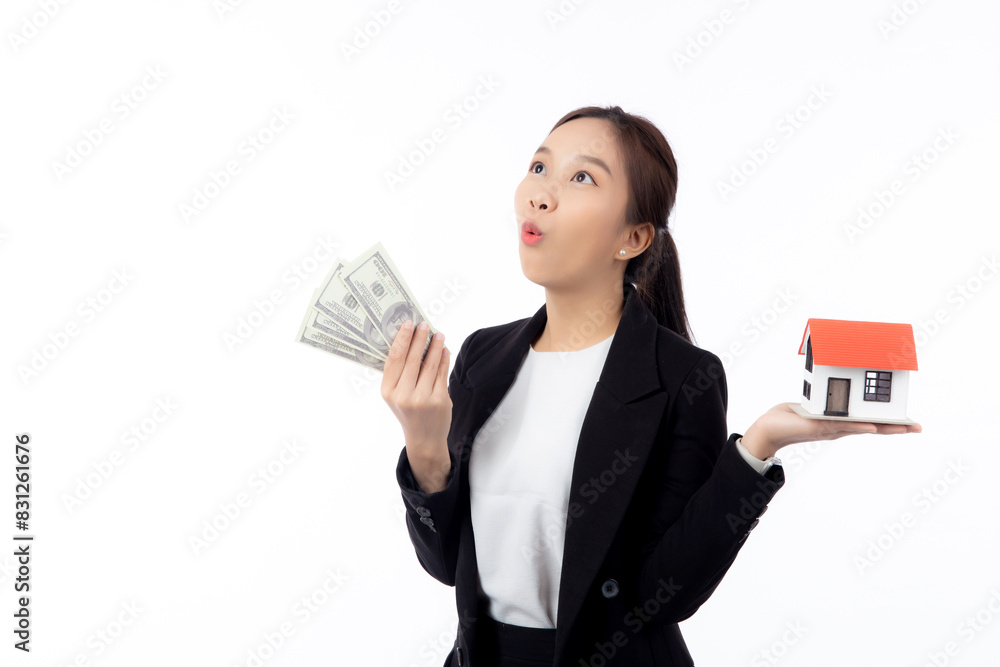 Portrait young asian businesswoman holding house and money for mortgage isolated white background, agent insurance business woman holding home for investment and presenting, business and finance. Portrait young asian businesswoman holding house and money for mortgage isolated white background, agent insurance business woman holding home for investment and presenting, business and finance.