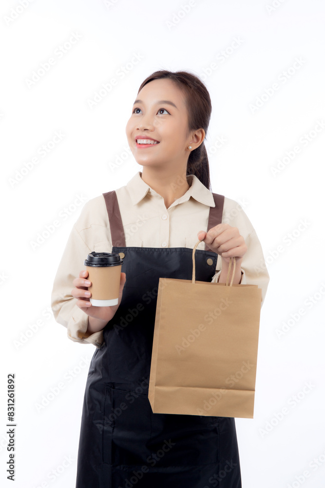 Young asian woman barista work attire happy holding a takeaway coffee cup and paper bag isolated white background, joyful barista presenting takeaway coffee with excited, small business or startup. Young asian woman barista work attire happy holding a takeaway coffee cup and paper bag isolated white background, joyful barista presenting takeaway coffee with excited, small business or startup.