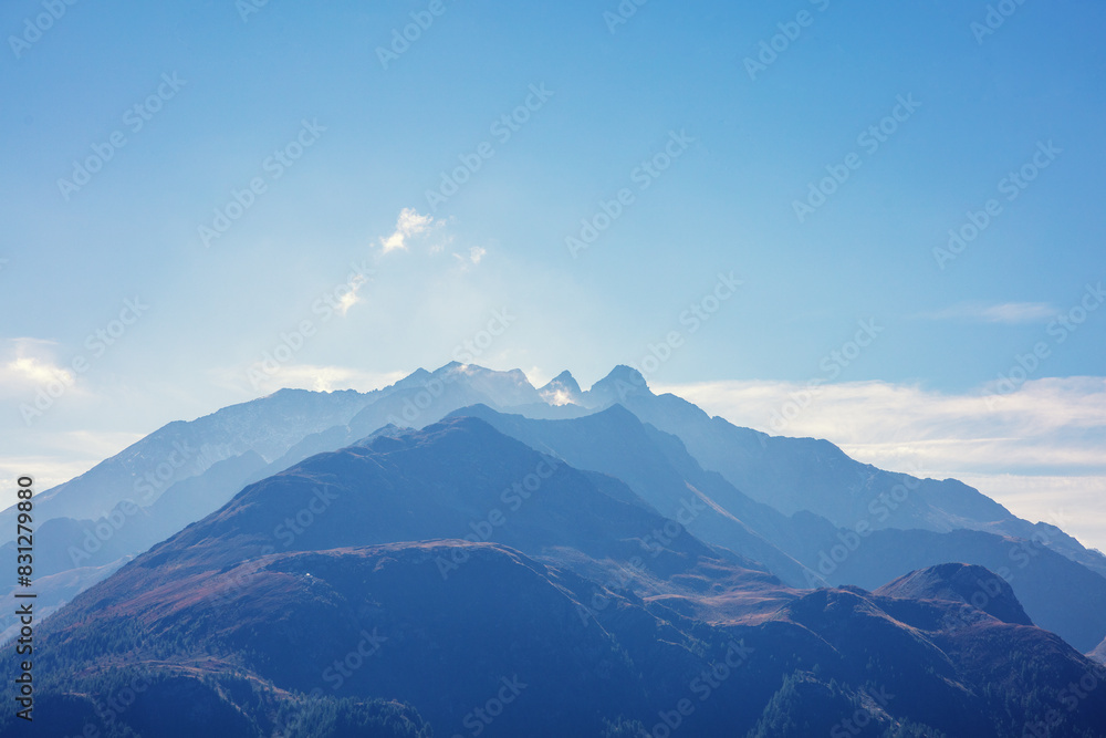 Mountain silhouette against day sky. View from Grossglockner High Alpine Road. Austria, Europe