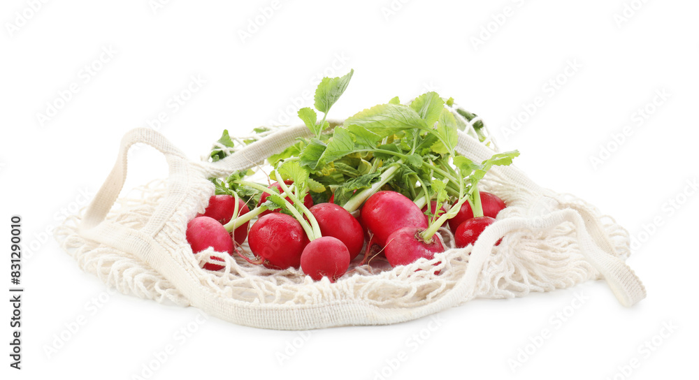 String bag with radishes isolated on white String bag with radishes isolated on white