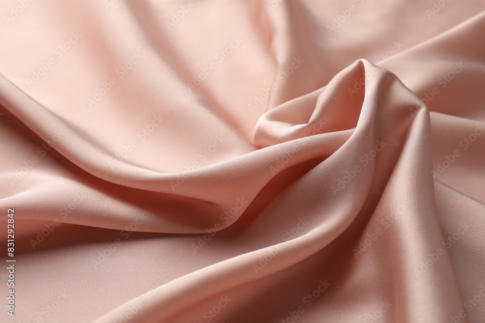 Crumpled pink silk fabric as background, closeup Crumpled pink silk fabric as background, closeup