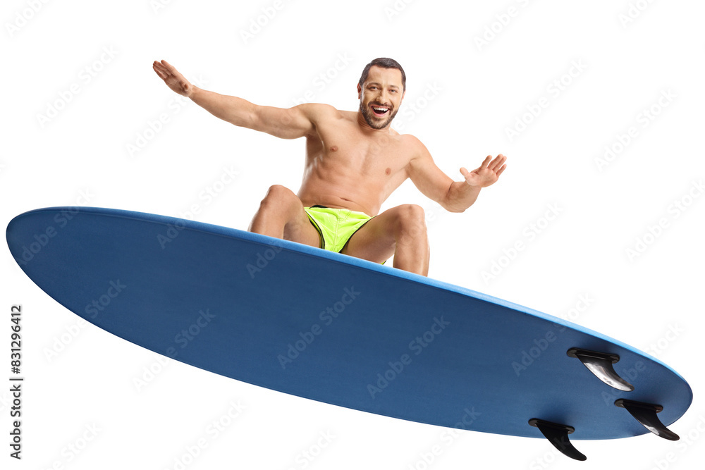 © Ljupco Smokovski - Man riding a surfboard and smiling © Ljupco Smokovski - Man riding a surfboard and smiling