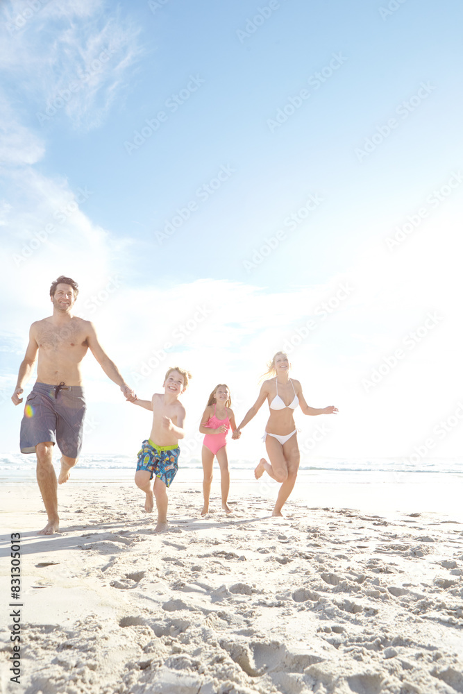 Running, freedom and excited family holding hands at a beach for summer, fun and bonding in nature on vacation. Travel, energy and happy kids with parents at sea for holiday, celebration and games