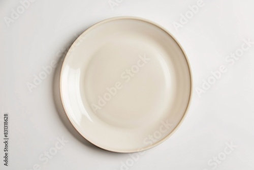 a white plate on a white surface