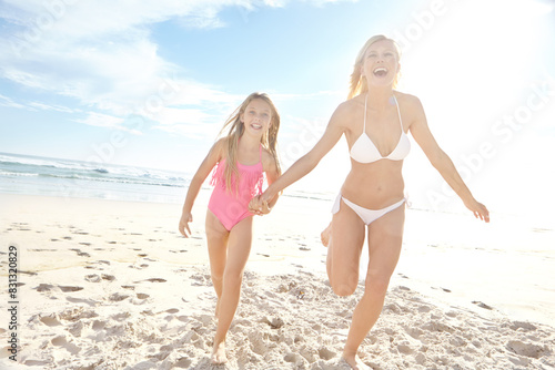 Smile, woman and kid at beach with running for summer holiday, adventure and bonding in sunshine. Nature, sea and mother with girl on sand by ocean for travel, vacation and weekend trip in California