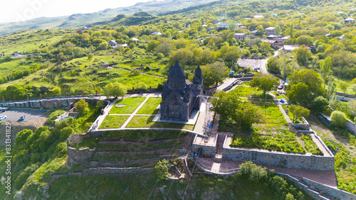 Tegher Monastery (The Monastery of Tegher) 13th century. Near the modern village of Tegher and across the gorge from Byurakan, Aragatsotn Province . Тaken with a drone. photo