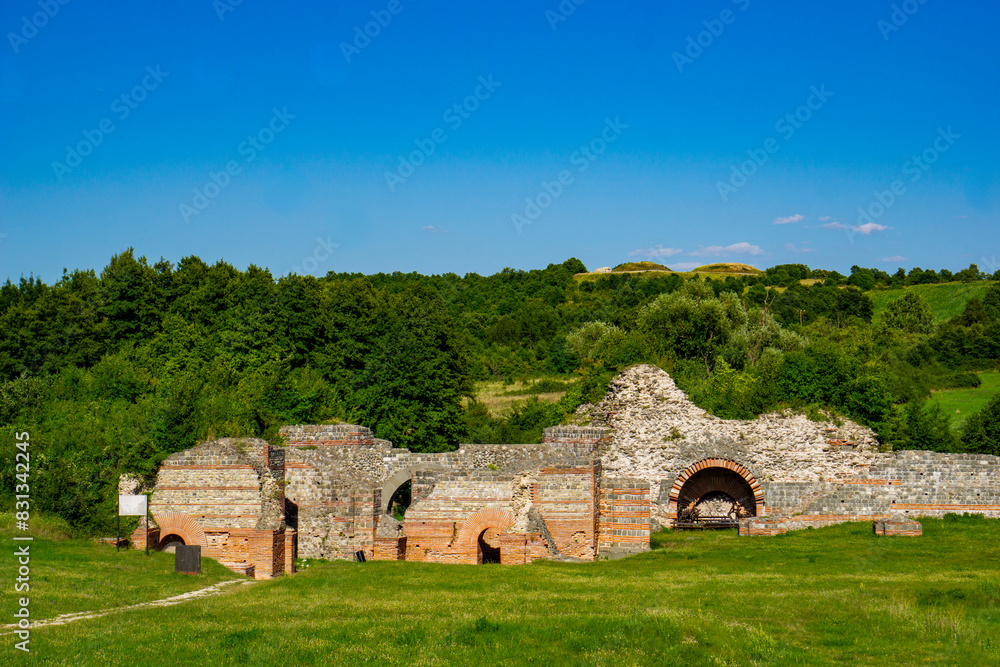 Ancient Roman ruins of Felix Romuliana near Gamzigrad in Serbia under the bright summer sky Ancient Roman ruins of Felix Romuliana near Gamzigrad in Serbia under the bright summer sky
