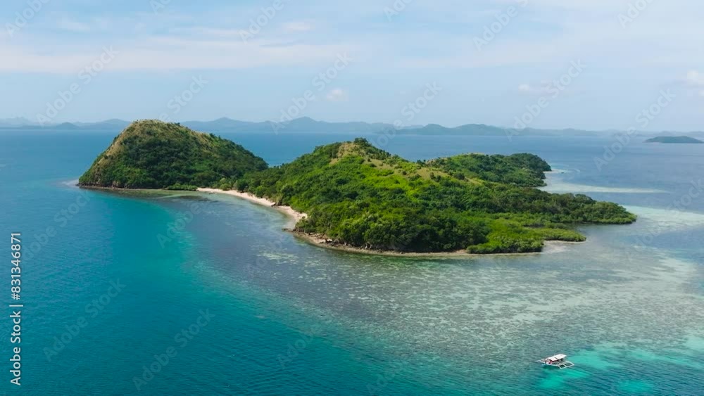 Dimanglet Island surrounded by turquoise sea water and corals. Blue sea in Coron, Palawan. Philippines. Dimanglet Island surrounded by turquoise sea water and corals. Blue sea in Coron, Palawan. Philippines.