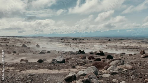 Floating air flow over volcanic ground photo