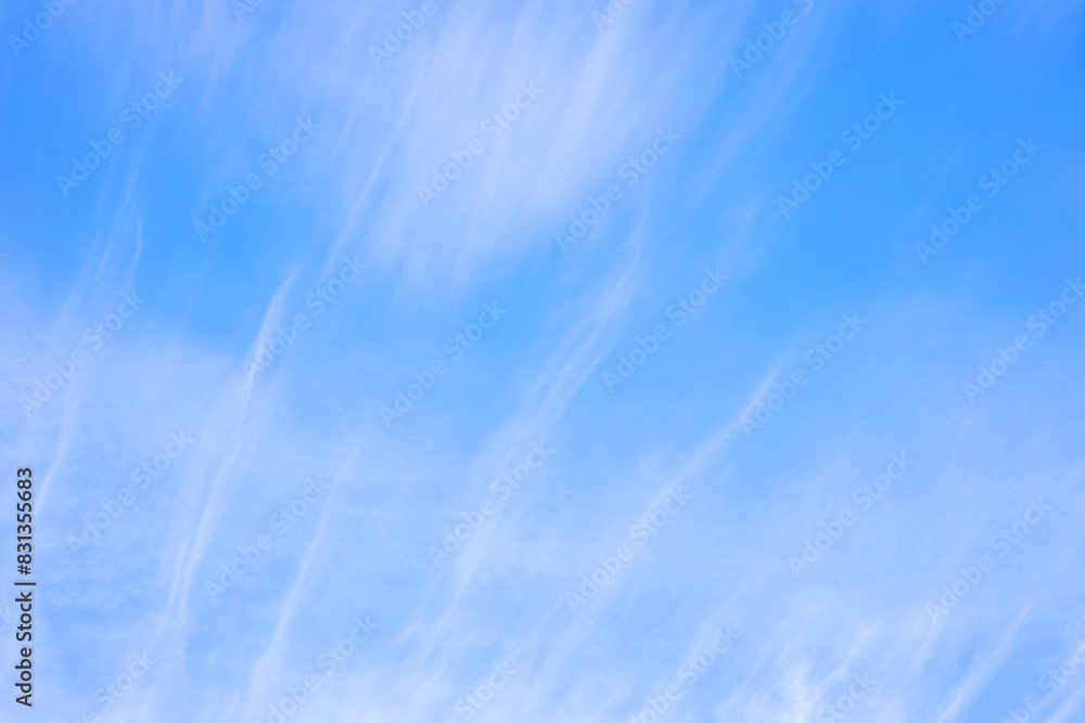 sky with feathery clouds on a blue background sky with feathery clouds on a blue background
