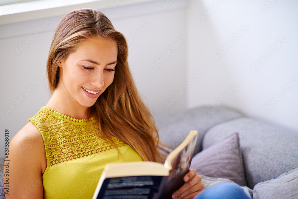 Woman, reading book and relax on sofa with happiness and literature or fantasy in home. Peace, smile and college student in apartment for studying, education and knowledge or story on weekend Woman, reading book and relax on sofa with happiness and literature or fantasy in home. Peace, smile and college student in apartment for studying, education and knowledge or story on weekend