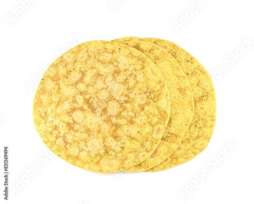 Yellow Roti bread, Makki ki roti, with corn meal   on white background. It is a round flatbread from India with many recipe varities photo