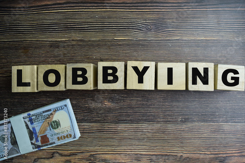 Concept of The wooden Cubes with the word Lobbying on wooden background.