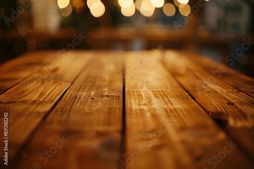 Wooden Table Top with Blurred Bokeh Background in Modern Cafe photo