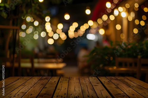Wooden Tabletop with Blurred Bokeh Background of Stylish Cafe