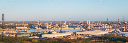 Aerial view of the industrial and port area of Ravenna ,chemical and petrochemical pole,thermoelectric,metallurgical plants and hydrocarbon refinery and liquefied natural gas tanks © robertobinetti70