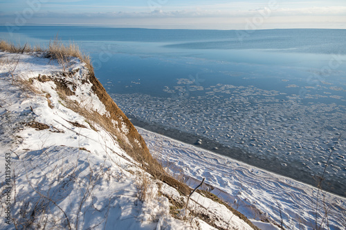 A spectacular winter landscape in the Russian countryside with waterfront. Surroundings of Taganrog. photo