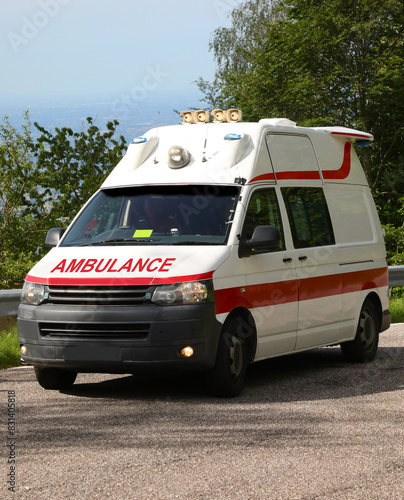 ambulance van with big Text while responding to an emergency on the road